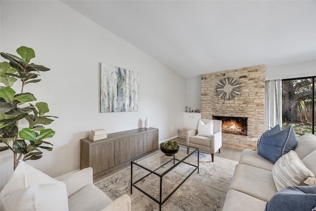 11309 Timbrook Trl, Austin, TX 78750 - living area with wood finished floors, lofted ceiling, and a fireplace