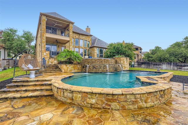 217 Emerald Ridge Dr, Austin, TX 78732 - view of pool with a fenced backyard, stairs, and ceiling fan