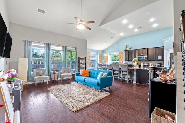 137 Paul Azinger Dr, Round Rock, TX 78664 - living room featuring ceiling fan, dark wood-style floors, high vaulted ceiling, and recessed lighting