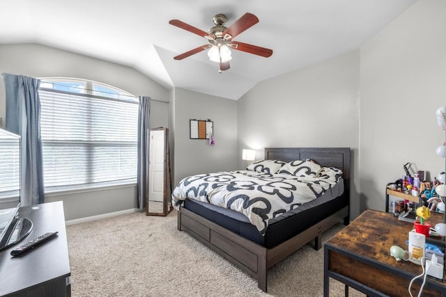 137 Paul Azinger Dr, Round Rock, TX 78664 - carpeted bedroom featuring lofted ceiling, multiple windows, and a ceiling fan