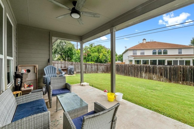 137 Paul Azinger Dr, Round Rock, TX 78664 - fenced backyard featuring ceiling fan, a patio, and an outdoor living space