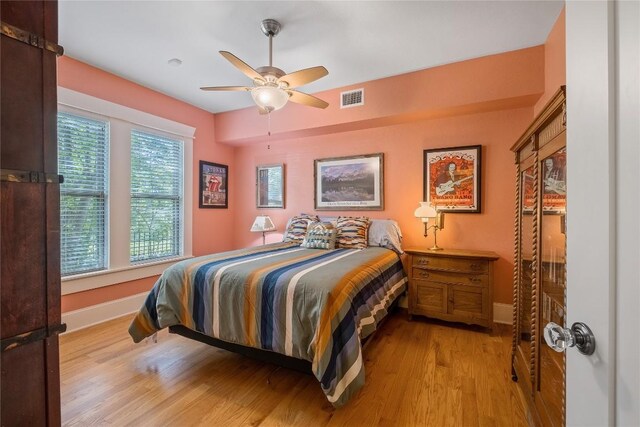 903 E 14th St, Austin, TX 78702 - bedroom with wood finished floors and a ceiling fan