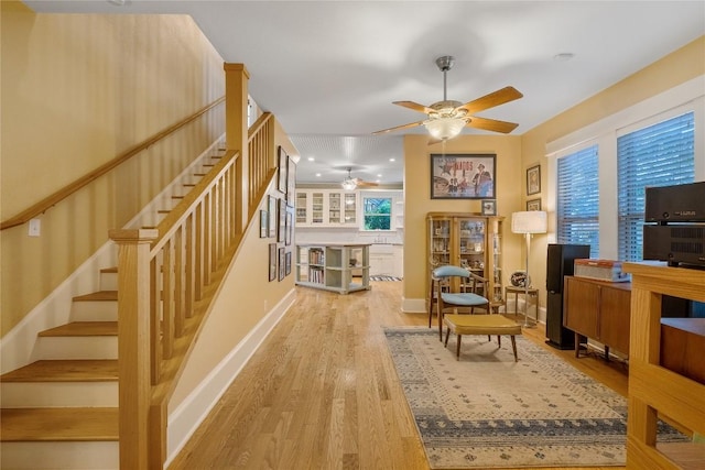 903 E 14th St, Austin, TX 78702 - staircase featuring ceiling fan and wood finished floors
