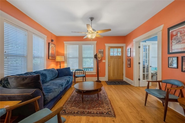 903 E 14th St, Austin, TX 78702 - living room with light wood finished floors and ceiling fan