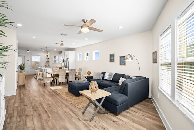 162 La Concha Blvd Unit 10, Port Aransas, TX 78373 - living area with healthy amount of natural light, light wood-style floors, a ceiling fan, and recessed lighting