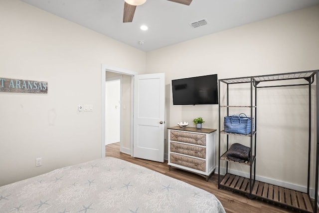 162 La Concha Blvd Unit 10, Port Aransas, TX 78373 - bedroom with wood finished floors, ceiling fan, and recessed lighting