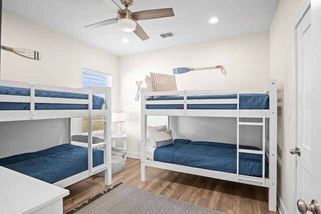 162 La Concha Blvd Unit 10, Port Aransas, TX 78373 - bedroom with wood finished floors, recessed lighting, and ceiling fan