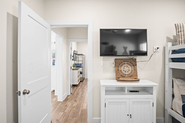 162 La Concha Blvd Unit 10, Port Aransas, TX 78373 - detailed view of wood finished floors and baseboards