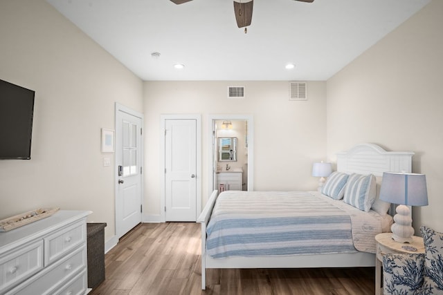 162 La Concha Blvd Unit 10, Port Aransas, TX 78373 - bedroom featuring wood finished floors, ensuite bathroom, ceiling fan, and recessed lighting
