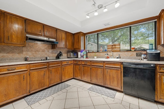 1303 Creekview Dr, Round Rock, TX 78681 - kitchen featuring black appliances, under cabinet range hood, light countertops, and light tile patterned flooring