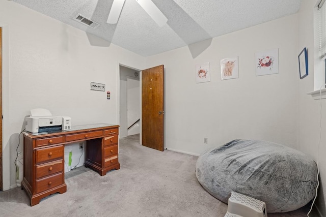 1303 Creekview Dr, Round Rock, TX 78681 - bedroom featuring light colored carpet, a textured ceiling, and a ceiling fan