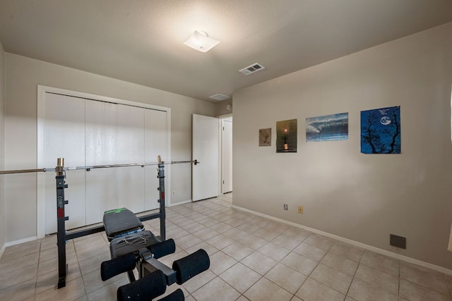 236 Lodestone Cir, Cedar Park, TX 78613 - exercise area with baseboards and light tile patterned floors