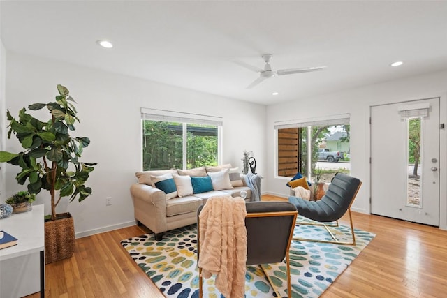 5507 Duval St Unit A, Austin, TX 78751 - living room featuring plenty of natural light, a ceiling fan, light wood finished floors, and recessed lighting