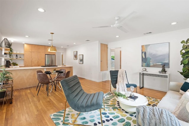 5507 Duval St Unit A, Austin, TX 78751 - living area with light wood finished floors, a ceiling fan, and recessed lighting