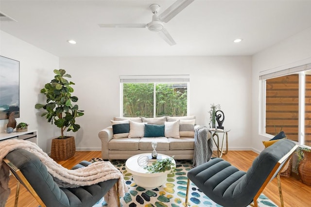 5507 Duval St Unit A, Austin, TX 78751 - living area featuring wood finished floors, a ceiling fan, and recessed lighting