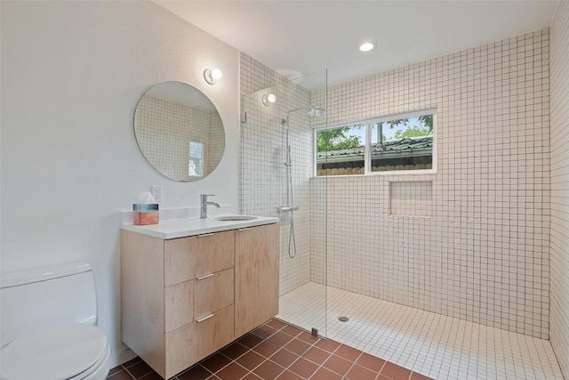 5507 Duval St Unit A, Austin, TX 78751 - bathroom featuring vanity, tiled shower, and tile patterned floors