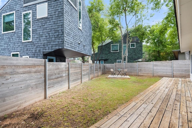 5507 Duval St Unit A, Austin, TX 78751 - fenced backyard with a wooden deck