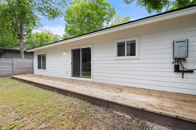 5507 Duval St Unit A, Austin, TX 78751 - back of property with a deck and tankless water heater