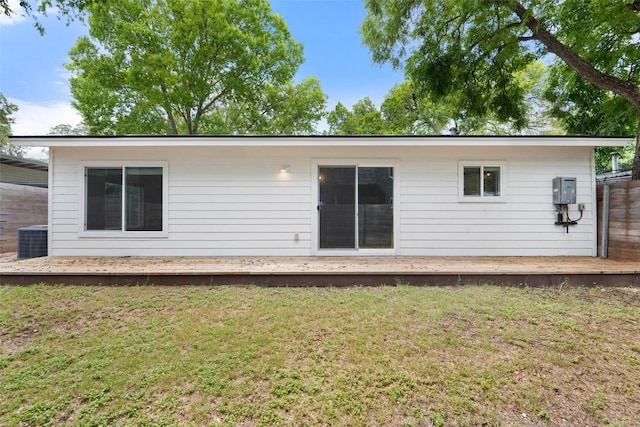 5507 Duval St Unit A, Austin, TX 78751 - rear view of house featuring a deck and a lawn