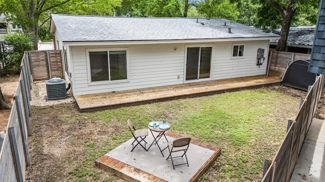 5507 Duval St Unit A, Austin, TX 78751 - rear view of property featuring a wooden deck, a fenced backyard, roof with shingles, and a patio