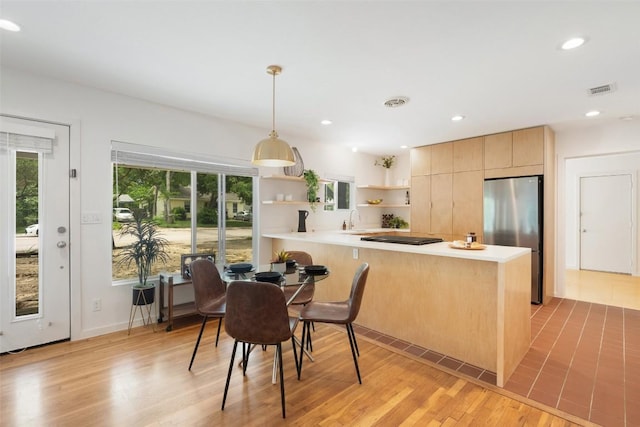 5507 Duval St Unit A, Austin, TX 78751 - dining room featuring light wood-type flooring and recessed lighting