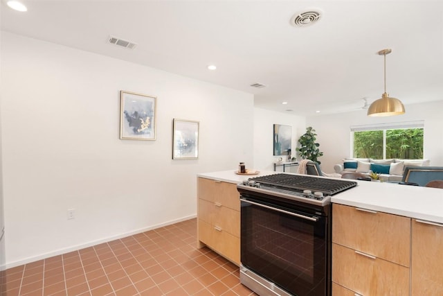 5507 Duval St Unit A, Austin, TX 78751 - kitchen featuring stainless steel gas stove, light brown cabinets, light countertops, recessed lighting, and modern cabinets