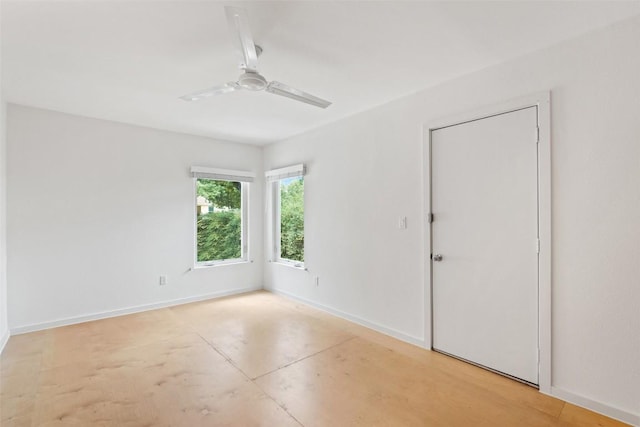 5507 Duval St Unit A, Austin, TX 78751 - empty room featuring baseboards and a ceiling fan