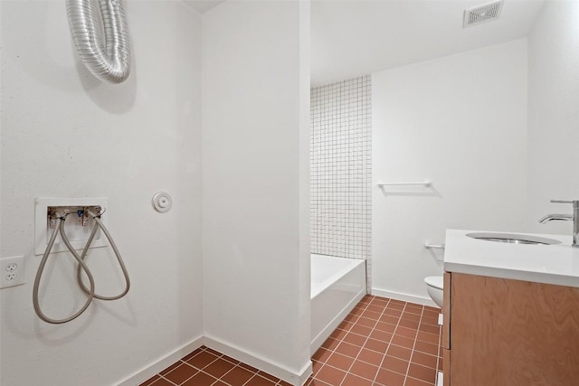 5507 Duval St Unit A, Austin, TX 78751 - bathroom featuring vanity, tile patterned floors, and washtub / shower combination