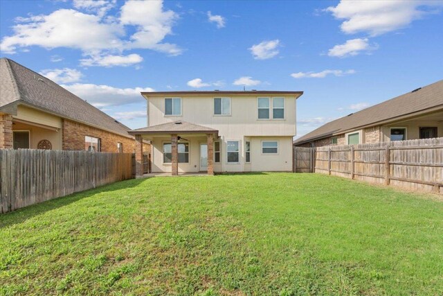 3211 Malmaison Rd, Killeen, TX 76542 - rear view of property with a fenced backyard and a patio