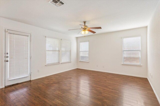 3211 Malmaison Rd, Killeen, TX 76542 - spare room with a ceiling fan, plenty of natural light, and hardwood / wood-style flooring