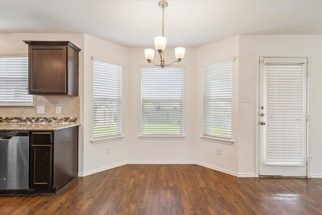 3211 Malmaison Rd, Killeen, TX 76542 - kitchen featuring stainless steel dishwasher, dark brown cabinets, a chandelier, and dark wood finished floors