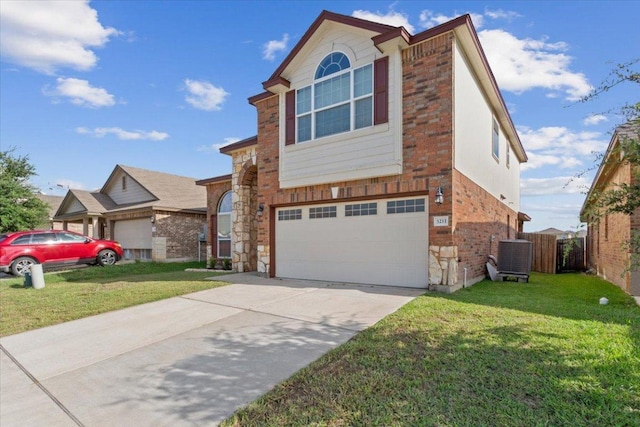 3211 Malmaison Rd, Killeen, TX 76542 - view of front of house with a garage, brick siding, concrete driveway, and stone siding