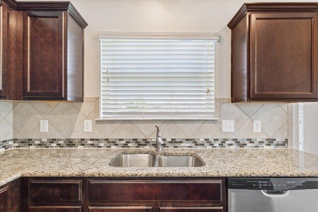 3211 Malmaison Rd, Killeen, TX 76542 - kitchen featuring stainless steel dishwasher, dark brown cabinets, and decorative backsplash