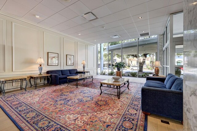 1801 Lavaca St Unit 9J, Austin, TX 78701 - lobby with a decorative wall and a wall of windows