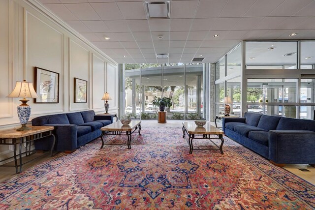 1801 Lavaca St Unit 9J, Austin, TX 78701 - lobby featuring expansive windows and a decorative wall