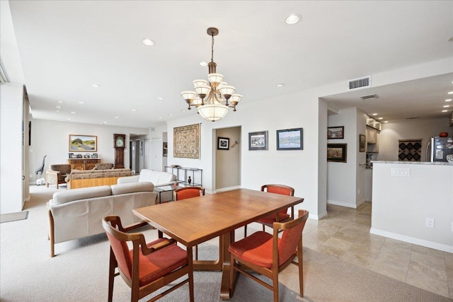 1801 Lavaca St Unit 9J, Austin, TX 78701 - dining area with recessed lighting and a chandelier