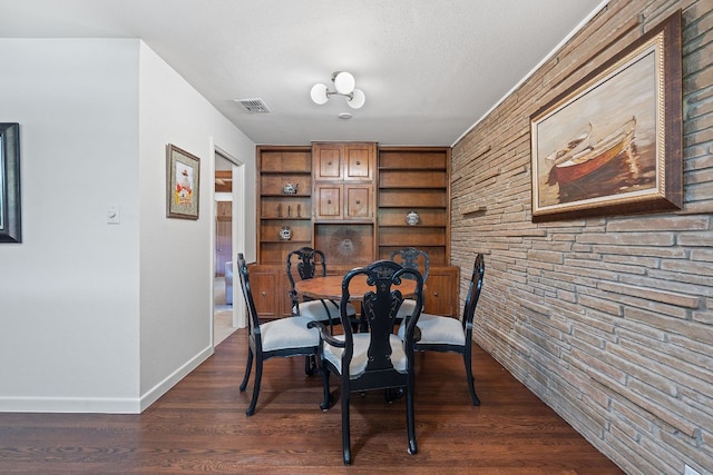 2609 Ellise Ave, Austin, TX 78757 - dining space with dark wood-style floors