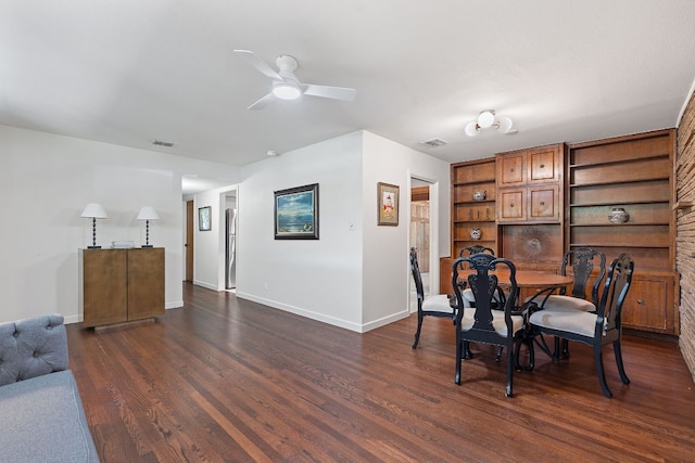 2609 Ellise Ave, Austin, TX 78757 - dining room with a ceiling fan and dark wood-style floors