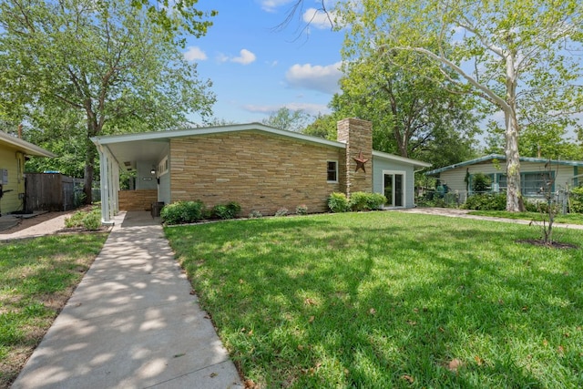 2609 Ellise Ave, Austin, TX 78757 - mid-century inspired home with stone siding and a chimney