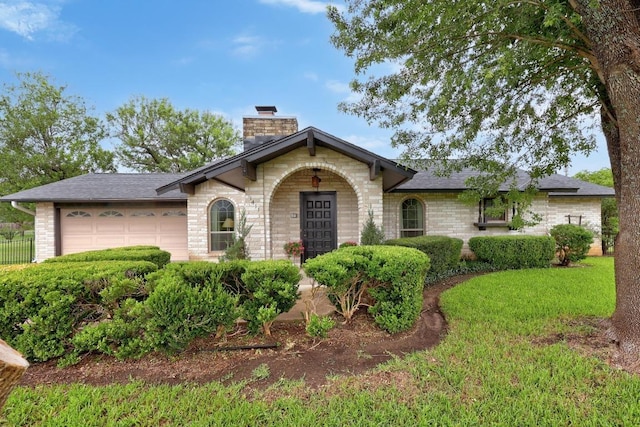 1411 Shenandoah Dr, Cedar Park, TX 78613 - view of front of house featuring a chimney, a garage, a shingled roof, and brick siding