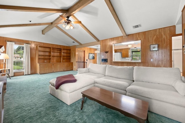 1411 Shenandoah Dr, Cedar Park, TX 78613 - living area featuring wooden walls, carpet floors, ceiling fan, and built in features