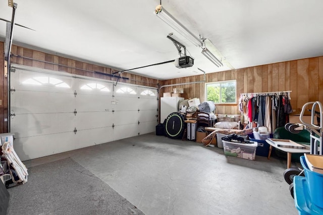 1411 Shenandoah Dr, Cedar Park, TX 78613 - garage with a garage door opener and wooden walls