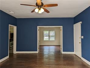 308 Taylor Rd, Elgin, TX 78621 - empty room featuring wood finished floors and ceiling fan