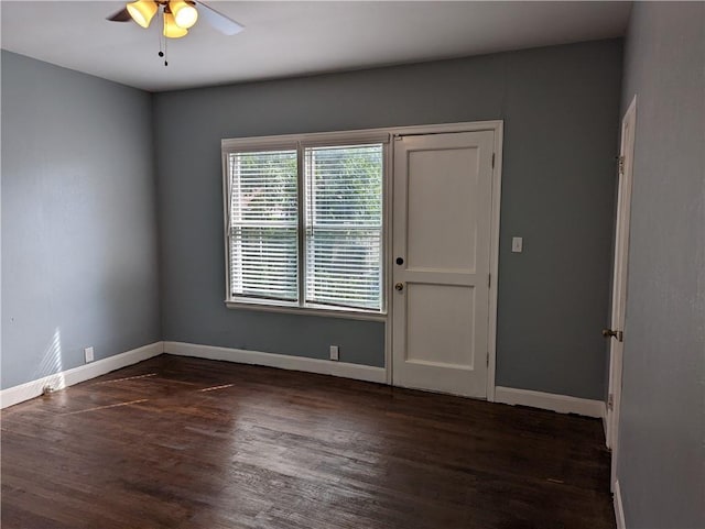 308 Taylor Rd, Elgin, TX 78621 - spare room featuring dark wood-style floors and ceiling fan