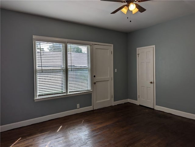 308 Taylor Rd, Elgin, TX 78621 - spare room featuring ceiling fan and dark wood finished floors