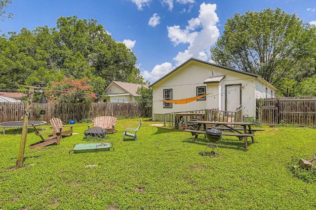 5605 Tura Ln, Austin, TX 78721 - rear view of house featuring a fenced backyard