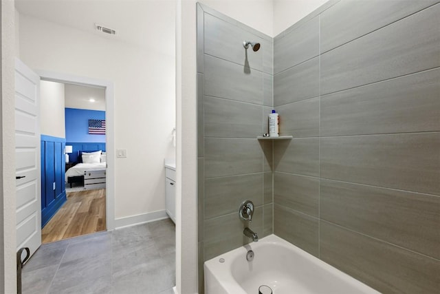 8405 Ambergill Ct, Austin, TX 78744 - ensuite bathroom with bathing tub / shower combination and vanity