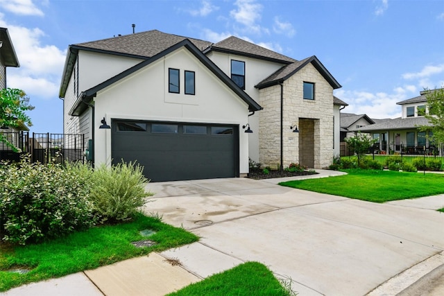 8405 Ambergill Ct, Austin, TX 78744 - view of front of property with stucco siding, concrete driveway, stone siding, roof with shingles, and a garage