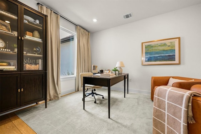 8405 Ambergill Ct, Austin, TX 78744 - home office with recessed lighting and light colored carpet