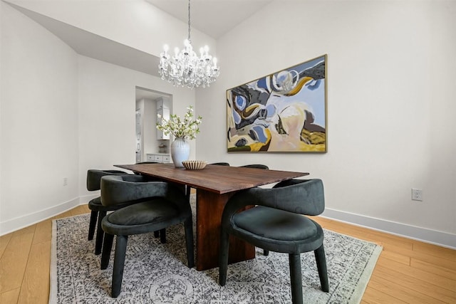 8405 Ambergill Ct, Austin, TX 78744 - dining room with a chandelier and wood finished floors